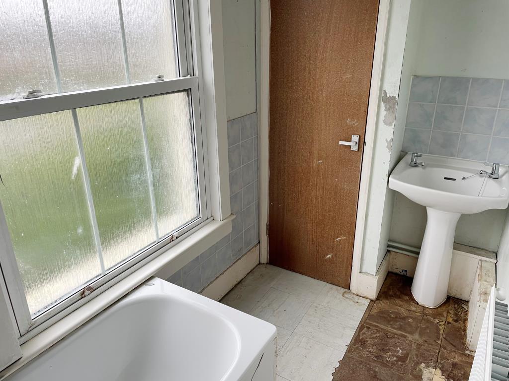 Lot: 109 - HOUSE IN NEED OF REFURBISHMENT AND REPAIR - Bathroom to rear with sink unit